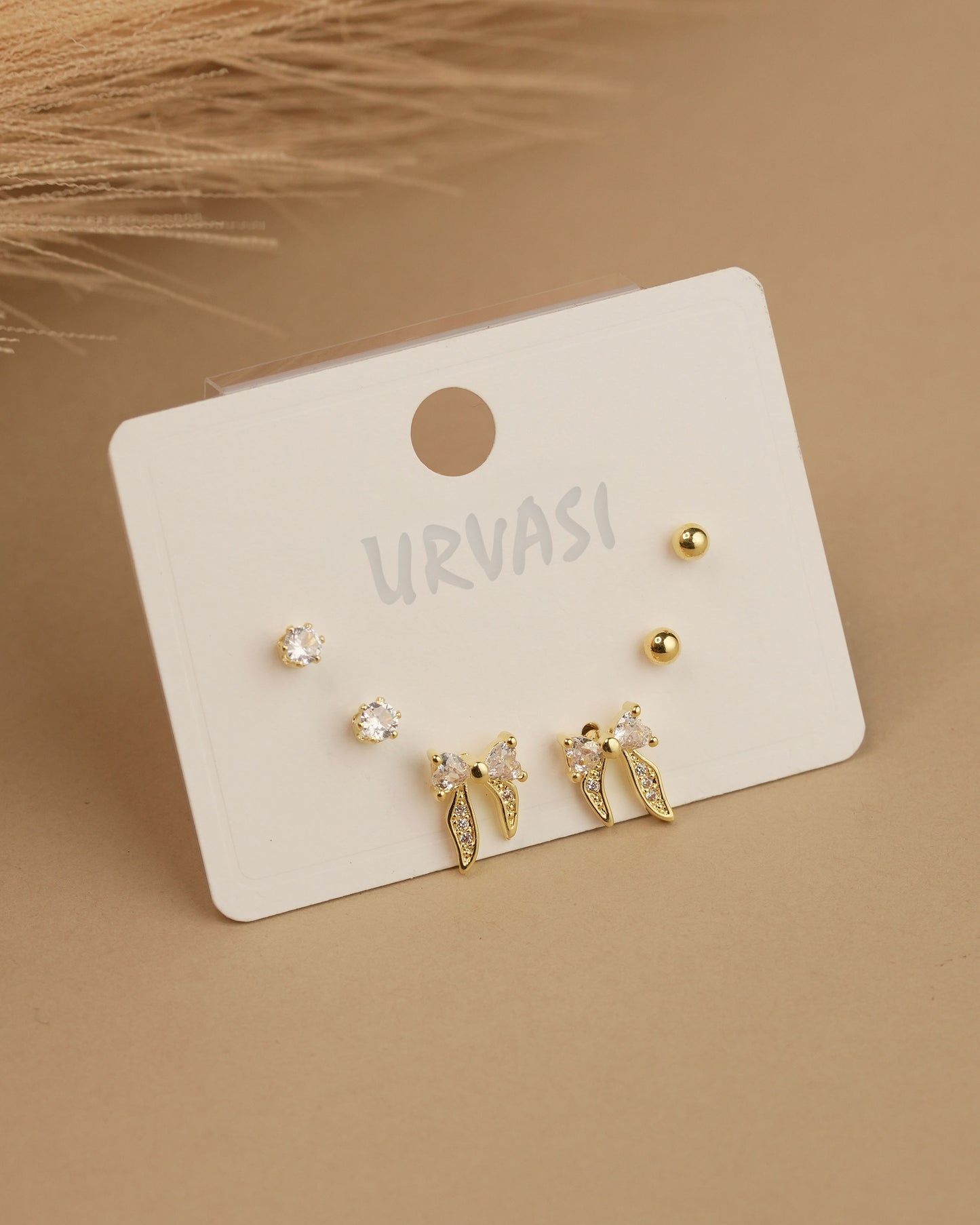 Gold-Polish Bow Designed Earrings ER 770