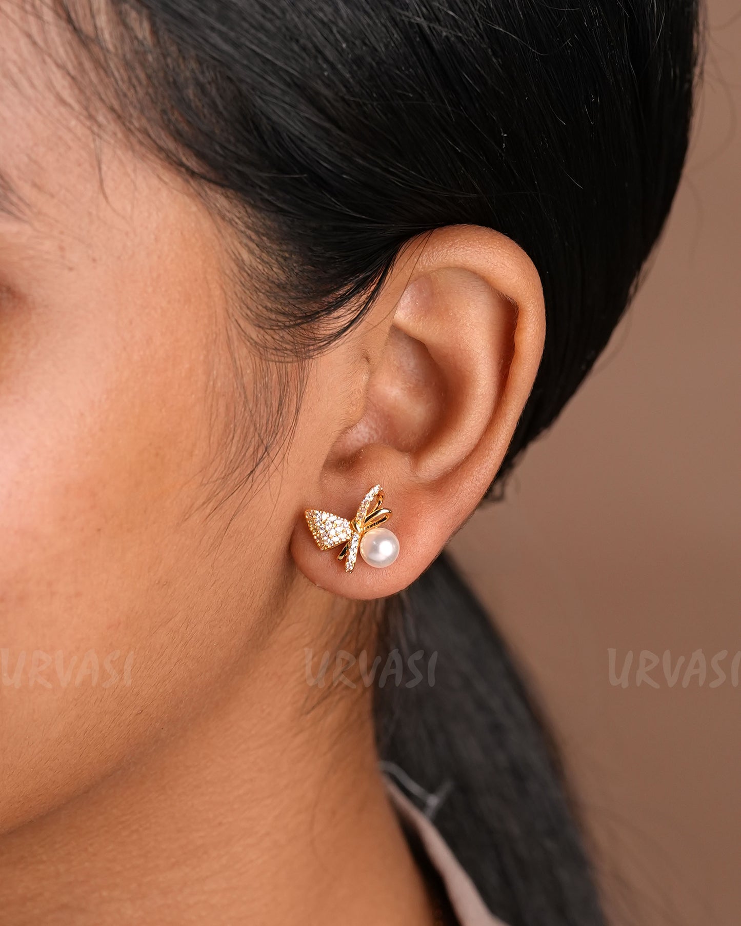 Gold-Polish Bow-Designed AD Pearl Earrings ER 907