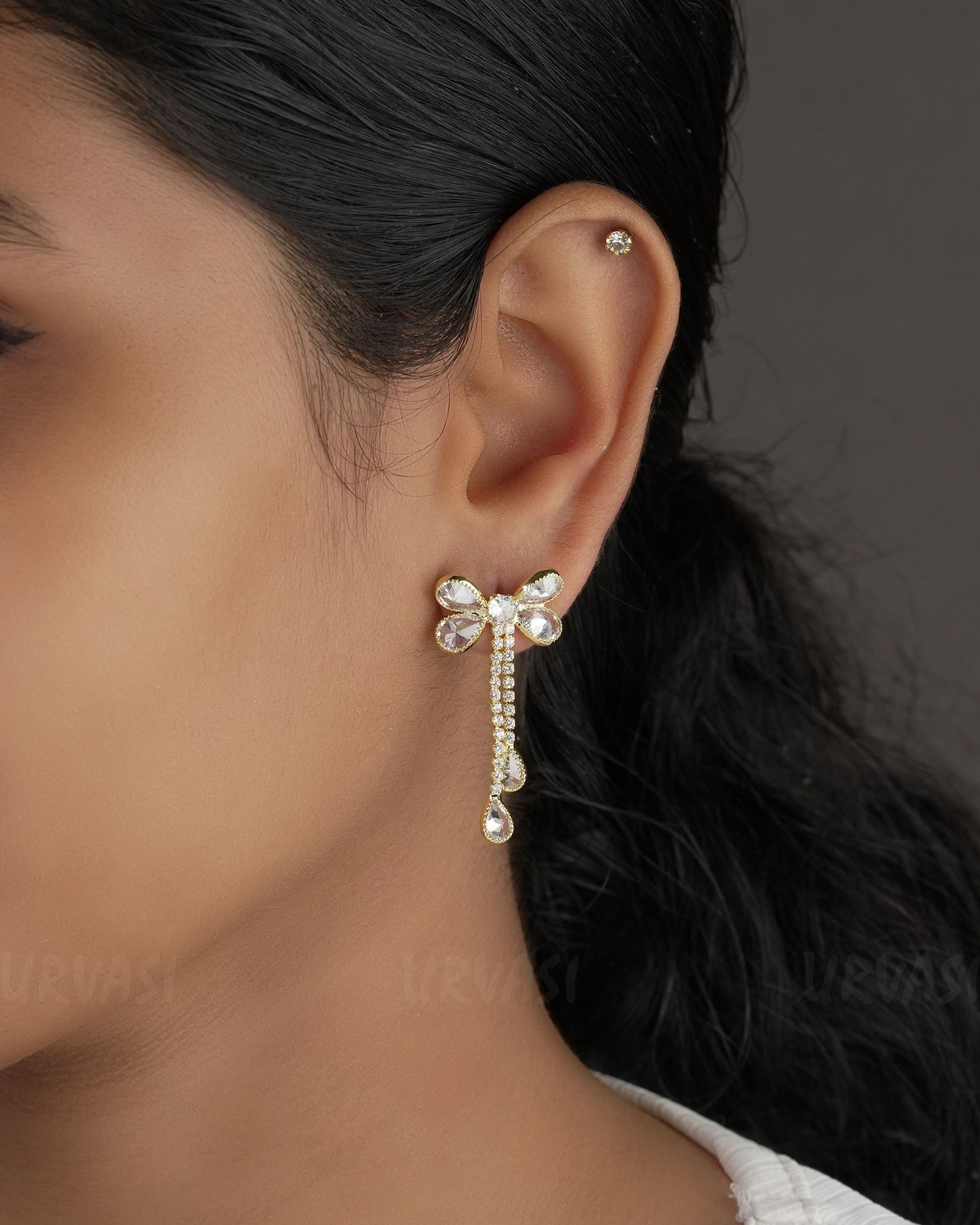 Gold-Toned Bow Designed Imported Earrings ER 558